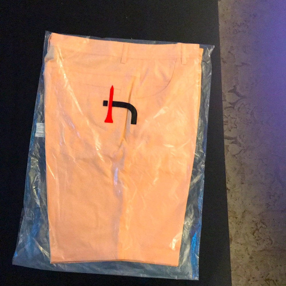 Peach/cream golf shorts